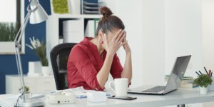 Real Estate Marketing mistakesStressed employee making mistake at office startup job